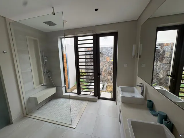 Villa Elysium — Bathroom with shower and twin basins