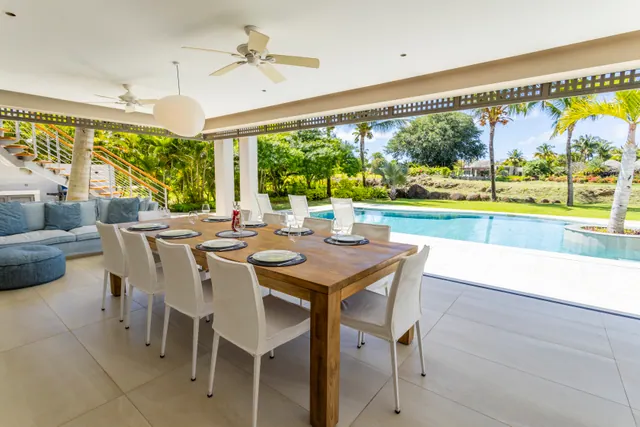 Villa Elysium — Dining room overlooking the swimming pool