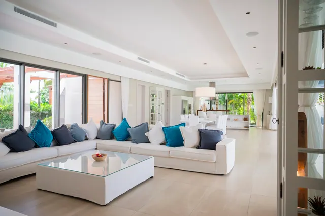 Villa Elysium — Bright living room opening onto the terrace